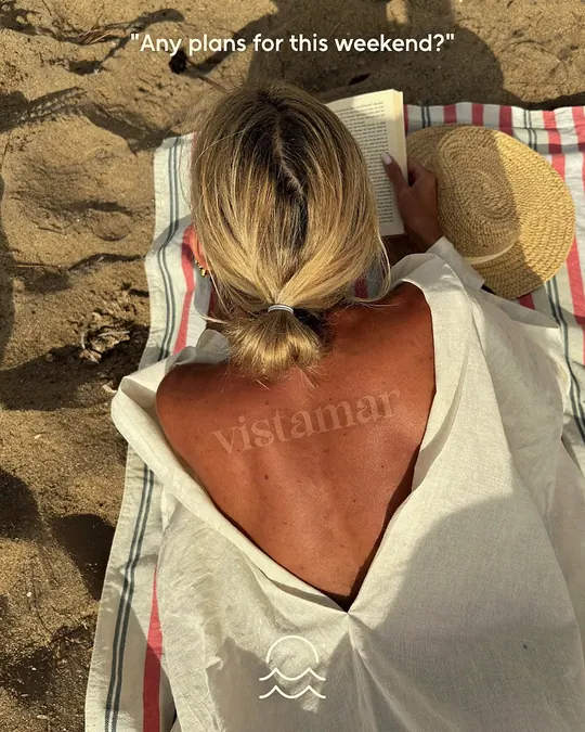 Instagram post: reading on a beach towel, captioned Any plans for this weekend?