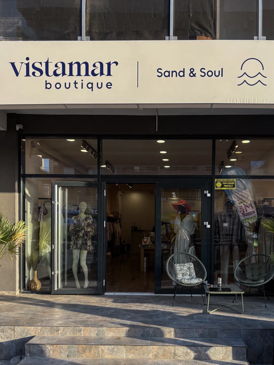 The Vistamar boutique storefront on Strada Lotus 2, Mamaia Nord, at golden hour